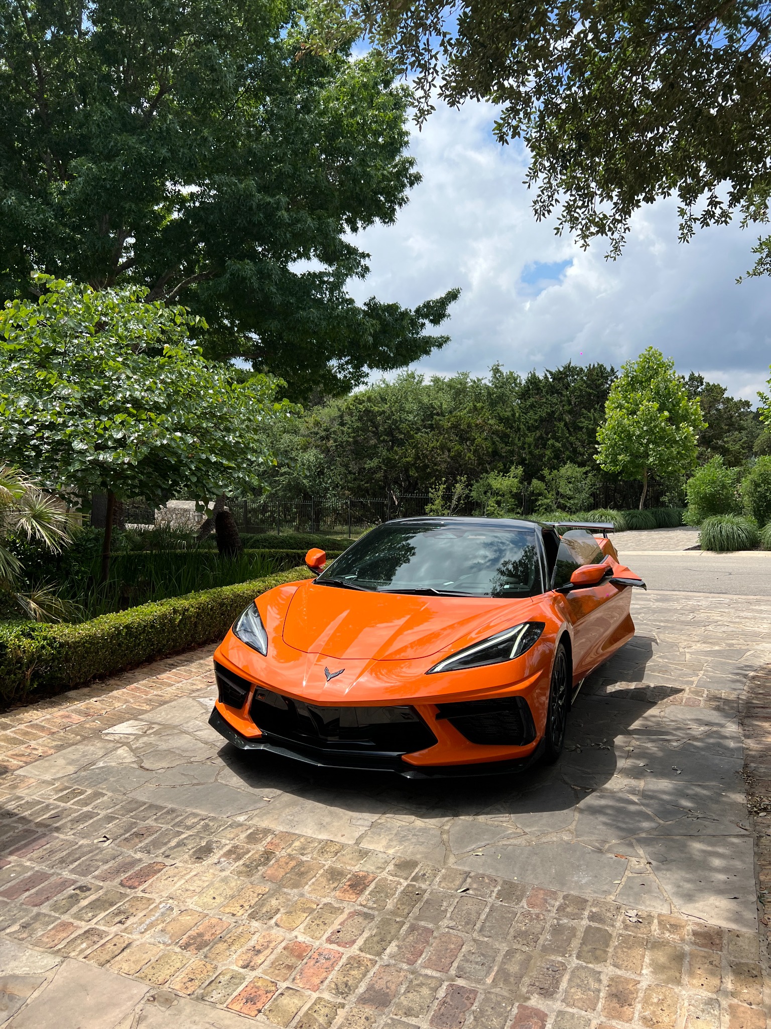 Orange Corvette with professionally tinted glass
