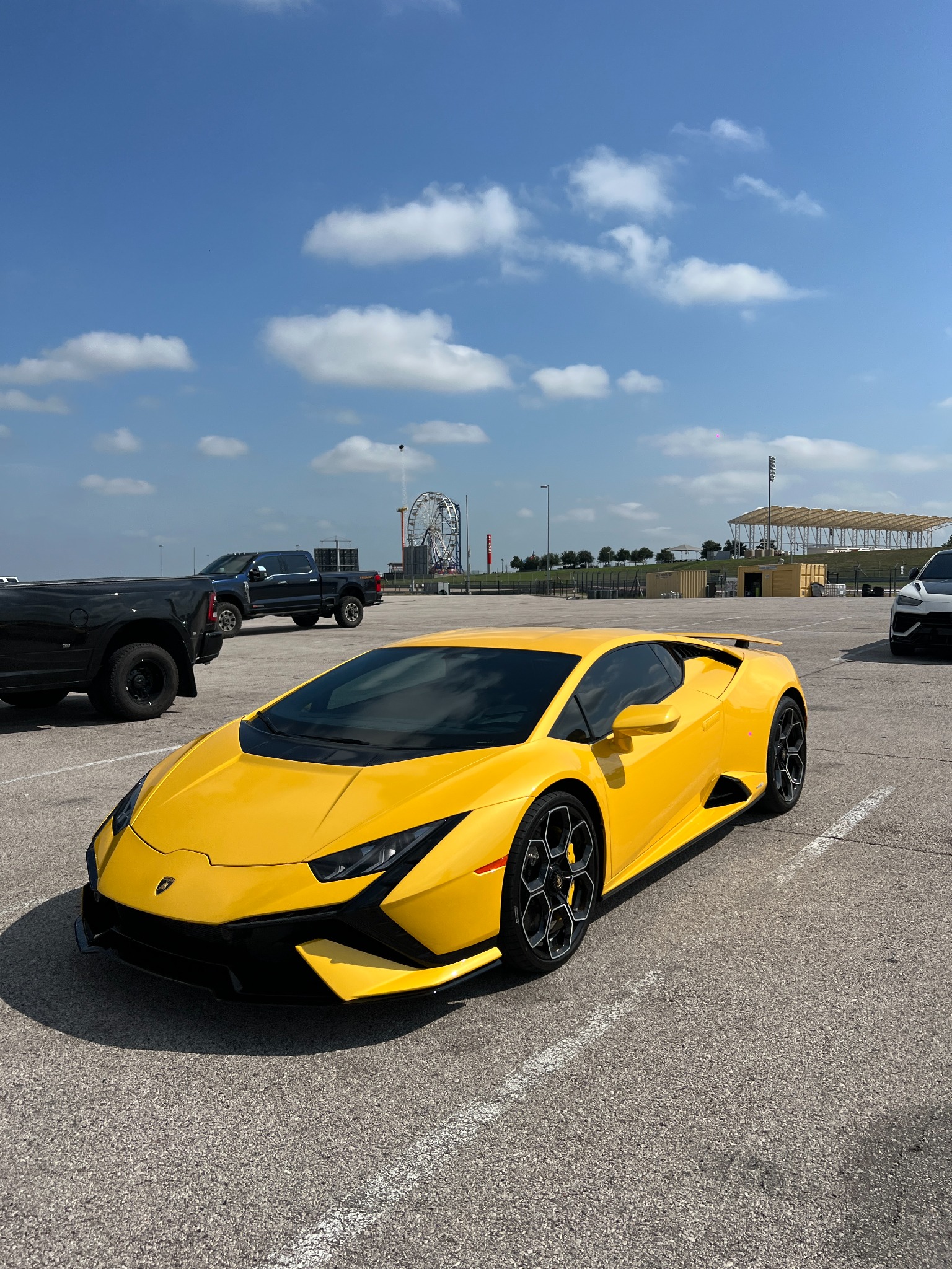Yellow Lamborghini with dark tinted windows